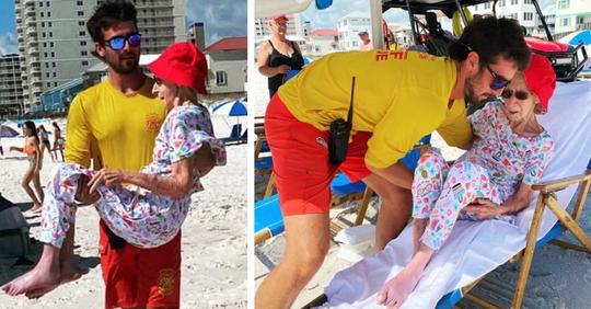 Bademeister trägt eine 95-jährige Frau auf den Armen, damit sie bis zu ihrem Liegestuhl kommt