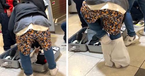 Beim Check in überschreitet sein Koffer die Gewichtsgrenze: Tourist zieht sich mehrere Lagen Kleidung über, bevor er ins Flugzeug steigt