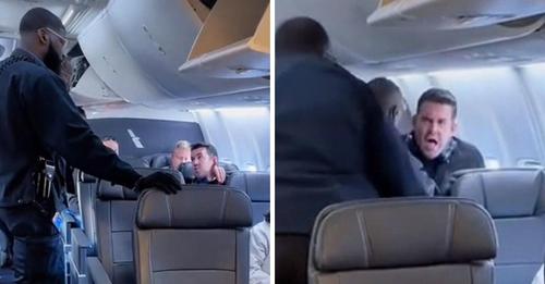 Erste Klasse Passagier bricht weinend zusammen, als er gezwungen wird, das Flugzeug zu verlassen
